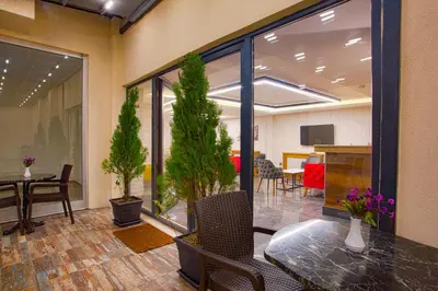 a conference room with a table and chairs and plants at Sim Hotel Istanbul Old City in Istanbul