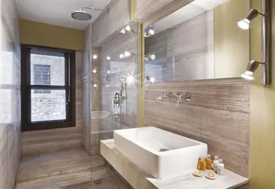 a bathroom with a white sink and a shower at Hotel Ibrahim Pasha in Istanbul