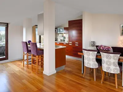 a kitchen and dining room with a table and chairs at Galateia Residence in Istanbul