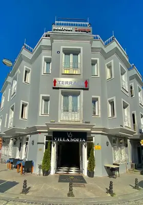 a large gray building with a sign on it at Villa Sofia in Istanbul