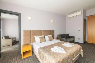 a hotel room with a bed and a chair at Taksim Hotel V Plus in Istanbul