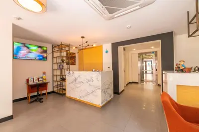 a room with a counter and a tv on the wall at Taksim Hotel V Plus in Istanbul
