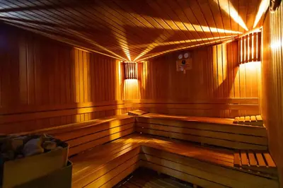 an empty sauna with wood paneling and lights on it at Mas Suites Nisantasi in Istanbul