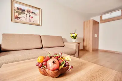 a bowl of fruit on a table in a living room at Bursa Suites Apart Otel in Bursa