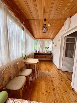 a dining room with a table and chairs at Charming Anatolian House in Çengelköy in Istanbul