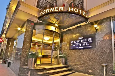 a store front of a corner hotel with a sign at Corner Hotel Laleli in Istanbul