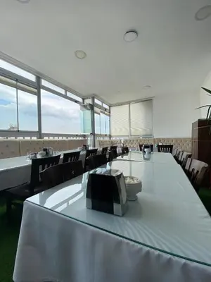 a large conference room with a long table and chairs at Polanin Hotel in Istanbul