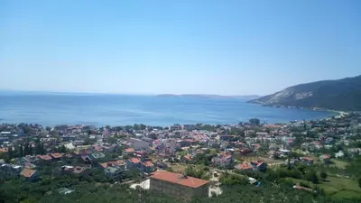 an aerial view of a town next to a body of water at Sağlık Apart Pansiyon in Erdek