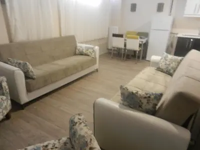 a living room with a couch and two couches at Best Home Suites Sultanahmet in Istanbul