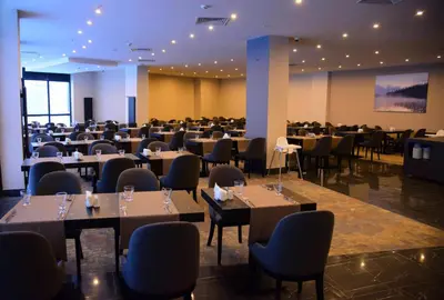 a large banquet hall with tables and chairs at Trendlife Hotels Uludağ ALL INCLUSIVE in Uludag