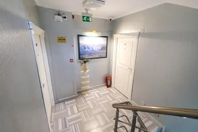 a room with a hallway with a painting on the wall at Loren Hotel&Suites in Istanbul