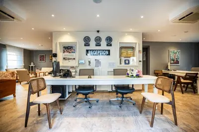 an office with a large white table and chairs at Tiara Buyukada in Buyukada