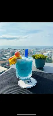 a drink on a table with a view of a city at Hotel Venera Istanbul Old City in Istanbul