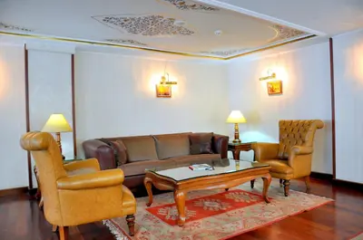 a living room with a couch and two chairs at Hotel Centrum Istanbul in Istanbul