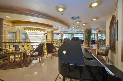 a room with a ping pong table and chairs at Wyndham Istanbul Old City in Istanbul