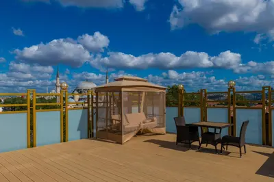 a gazebo with a table and chairs on a deck at Wyndham Istanbul Old City in Istanbul