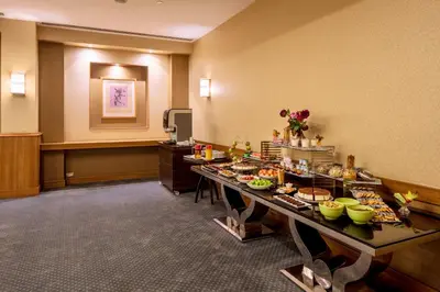 a buffet of food on a table in a hotel room at Holiday Inn Sisli by IHG in Istanbul