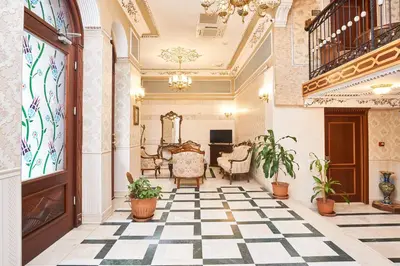 a lobby with a black and white checkered floor at Amber Hotel & Spa in Istanbul
