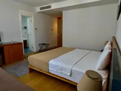 a bedroom with a large bed in a room at Misafir Suites 8 Istanbul in Istanbul