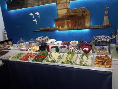 a table filled with different types of food at Sphendon Hotel in Istanbul