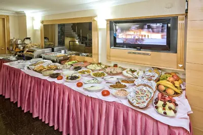 a table with a buffet of food on it at Park Star Hotel Taksim in Istanbul