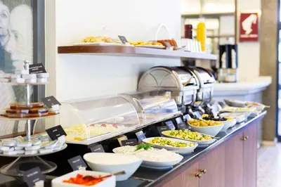 a buffet line with many different types of food at Hotellino Istanbul in Istanbul