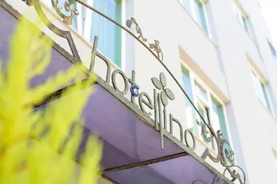 a sign on the side of a building at Hotellino Istanbul in Istanbul