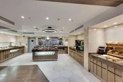a bakery aisle with bakery items on display at Ramada by Wyndham Istanbul Old City in Istanbul