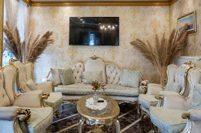 a living room with a couch and chairs and a tv at Angels Garden Hotel - Special Catagory in Istanbul