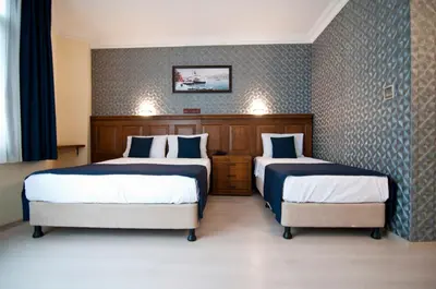 a hotel room with two beds in it at Artefes Hotel Old City in Istanbul