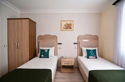two beds in a small room with sidx sidx sidx at Artefes Hotel Old City in Istanbul
