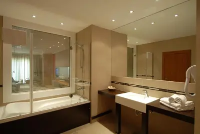 a bathroom with a tub and a sink and a shower at Klas Hotel Istanbul Old City in Istanbul