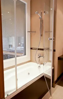 a bathroom with a shower with a glass door at Klas Hotel Istanbul Old City in Istanbul
