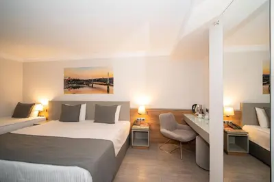 a hotel room with a bed and a desk at Klas Hotel Istanbul Old City in Istanbul