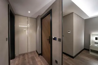 a hallway with a elevator and a door at Pianoforte by Febor Hotels&Spa in Istanbul