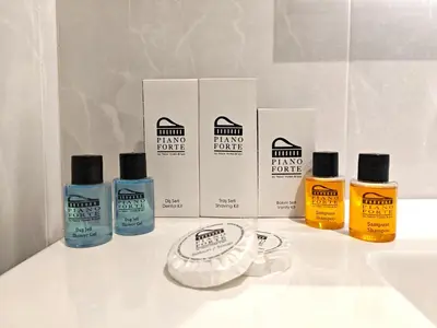 a group of four products sitting on a bathroom counter at Pianoforte by Febor Hotels&Spa in Istanbul