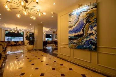 a large painting on the wall of a lobby at Berr Hotel in Istanbul