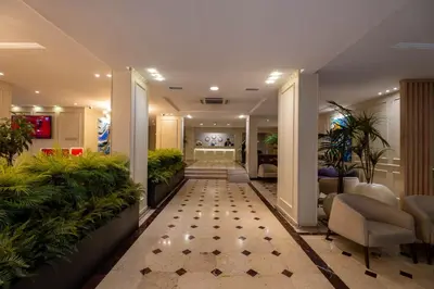 a hallway with plants in a hotel lobby at Berr Hotel in Istanbul