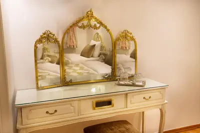 a dressing table with a mirror on top of it at Valide Sultan Konagi in Istanbul