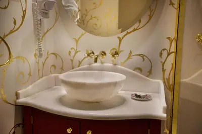 a bathroom with a sink with a bowl on it at Valide Sultan Konagi in Istanbul