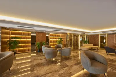 a hotel lobby with chairs and a waiting room at Grand Hotel Gulsoy Old City in Istanbul