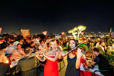a group of people playing instruments in front of a crowd at Seres Hotel Old City in Istanbul