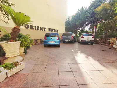 a group of cars parked in a parking lot at Orient Mintur Hotel in Istanbul