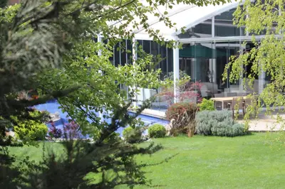 a house with a swimming pool in a yard at Baia Bursa Hotel in Bursa