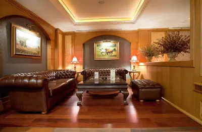 a living room with a couch and a table at Oran Hotel in Istanbul