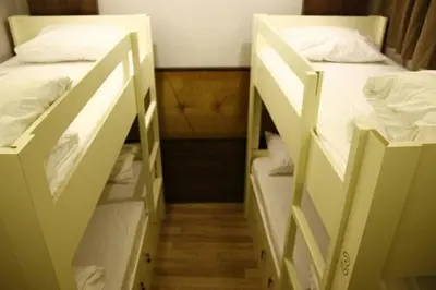 two white bunk beds in a small room at Bucoleon by Cheers in Istanbul