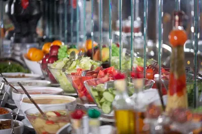 a buffet with many dishes of food on a table at Aspen Hotel & SPA Istanbul Old City in Istanbul