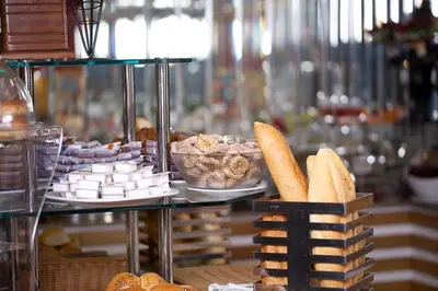 a buffet of bread and pastries on a table at Aspen Hotel & SPA Istanbul Old City in Istanbul