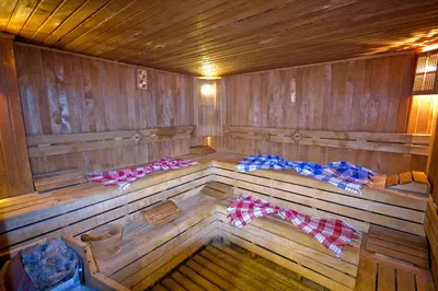 an inside of a wooden sauna with bows on it at Aspen Hotel & SPA Istanbul Old City in Istanbul