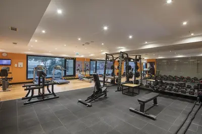 a gym with treadmills and machines in a room at Holiday Inn Istanbul - Tuzla Bay by IHG in Istanbul